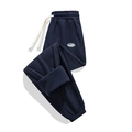 Pantaloni sportivi da uomo in pile blu scuro con coulisse e interno felpato - S / Blu navy