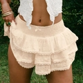 Mini-jupe chic en dentelle beige avec volants superposés et broderie florale - S / Abricot