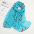 Close-up of pink flower embroidery on a light blue chiffon scarf with leaf details - Lake Blue