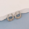 Detailed view of silver hoop earrings with textured horizontal grooves and snap closure - Silver Striped Groove Hoop