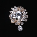 Elegant gold flower brooch with pear-cut crystal clusters and teardrop pendant - MM-BR-0038 / Gold