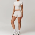 Two-piece cream white yoga set with short sleeve crop top and high waist sports shorts - S / Top And Bottom / Short Sleeve + Shorts / Pearl Grey