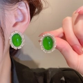Close-up of green emerald glass earrings with elegant sparkling zircon stone setting - 16# 925 Sterling Silver Earring Post - Luxury Zircon Oval Stud Earrings - Gold Green