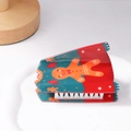 Christmas sweater hair claw clip featuring gingerbread man pattern in festive red and green - Red Green Gingerbread Man