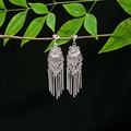 Ethnic silver tassel earrings with flower petals hanging on a natural green branch - E4963-6 (Long Stick Tassel)