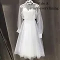 Vestido de novia marfil en tul de lunares con mangas abullonadas y silueta línea A - US size 2 (S) / Estilo A Marfil