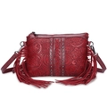 Red Bohemian fringe crossbody bag with floral embossing and dark metal rivets - Burgundy