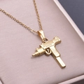 Macro detail of 18k gold plated submachine gun pendant on a champagne jewelry tray - Necklace (Gold)