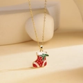 Festive gold Christmas stocking pendant necklace with red and green enamel accents - Christmas Boot / Gold
