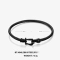 Black stainless steel cable bracelet with gold-plated horseshoe buckle 5.7cm diameter - Black Horseshoe Buckle Bangle
