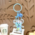 Blue cartoon bear quicksand keychain with colorful beads and matching bell accessory - Blue Mouse Milk Bean
