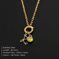 14K vergulde roestvrijstalen ketting met letter A en gele kristallen hanger - Letter R