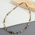 Handmade beaded necklace with tiger eye, labradorite and shells on rustic wood background - Multi-material Patchwork Labradorite Beaded Style (XL-789J)