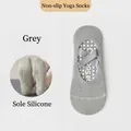 Calze da yoga grigie antiscivolo con cinturini elastici incrociati e punti in silicone - Taglia unica / Grigio
