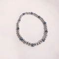 Polished silver beaded bracelet with dark blue evil eye charms in a minimalist design - Black Eye - Silver