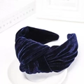 Detail shot of the twisted knot design on high-quality dark blue velvet headband - Navy Blue