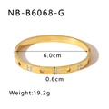 Detalle de brazalete en acero inoxidable con baño de oro 18K, estrella y diamantes - Oro de 18K / Dorado (NB-B6068-G)