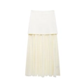 Detalle de falda plisada crema elegante con contraste de tejido y costura de malla - S / Blanco lechoso