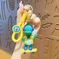 Green dinosaur skateboard keychain with yellow strap and Adorable round tag - Sports Dinosaur - Yellow Skateboard