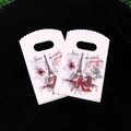 Set of 2 white plastic gift bags with Paris fashion print and wavy top edge - No. 70 (Paris Personality)
