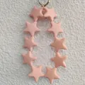 Pink silicone star-shaped keychain charm with golden metal ring for bags and keys - Peach (10 Stars)