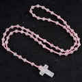 Pink natural quartz bead rosary necklace with a transparent cross pendant on black base - Rose Quartz