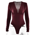 Detail view of wine red V-neck bodysuit with pleated fabric on a ghost mannequin - S / Burgundy