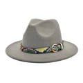 Detail of grey wool fedora featuring a vibrant faux snake print band and gold buckle - M (56-58cm) / Light Gray