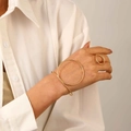 Close-up of minimalist gold geometric bangle and ring set on model with white shirt - Bracelet and Ring Set in Gold (2145+K-503)