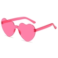 Pink heart-shaped rimless jelly sunglasses with translucent finish in a stylish 45-degree view - Rose Red