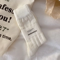 Calze bianche in maglia a rete traspirante stile crema minimalista per l'estate - Piccoli Pois