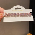 Macro view of French style bracelet with pink round-cut crystals in silver claw settings - 27# Bracelet-Silver-Pink