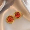 Macro detail of vintage tiger eye geometric earrings with layered gold metal trim - Amber Round Multi-Layer Metal Studs (26#) / Gold-Coffee-Round