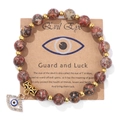 Reddish marble bead bracelet with golden evil eye charm and white crystal detailing - 19cm / Leopard Skin Jasper