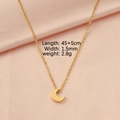 Detail shot of golden crescent moon necklace with 45+5cm chain length and 1.5mm width - Moon Gold