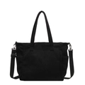Grande borsa tote in velluto a coste nero con doppi manici e tracolla su fondo bianco - Taglia unica / Nero