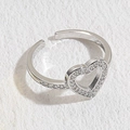 Verstellbarer silberner offener Ring mit hohlem Herzdesign und Zirkonia-Besatz - Zirkon Herz Weißgold