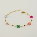 Gold chain bracelet featuring colorful floral crystal bead pendants and lobster clasp - Bracelet / Colorful
