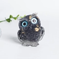 Deep gray crystal resin owl figurine with striking blue eyes and gold accents - Obsidian + Gold Foil