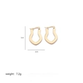 Detail view of gold irregular U-shaped stainless steel earrings with 3cm x 2cm dimensions - Rounded U-Shape Buckle