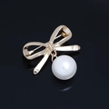 Elegant gold bow brooch featuring a dangling white round pearl in a polished finish - Plain Bowknot Gold Pearl