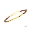 Detail of faceted brown beads bracelet with gold-plated ribbed beads and lobster clasp - Coffee Flash Flat Bead
