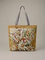 Vintage canvas tote bag featuring vibrant daisy floral embroidery and striped handles - Green Grass