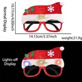 LED-Weihnachtsmütze Brille mit Merry Christmas Schriftzug und leuchtenden Partyeffekten - Integrierte LED-Blinkbrille / Roter Glänzender Stoff Weihnachtsmann-Hut-Stil
