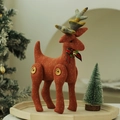Handmade Christmas deer fabric ornament in rusty red with golden stars and bell - Rust Red Star Pattern Christmas Reindeer