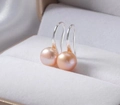 Macro shot of pink pearl earrings with silver hooks in a grey velvet jewelry box - White Gold / 9mm Pink Natural Pearl Earrings