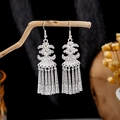 Silver long tassel earrings in ethnic bohemian style with floral accents and hook design - Vintage Hook Long Tassel Style (E5774-17)