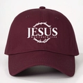 Detailed close-up of dark red cotton baseball cap with white Jesus Way Truth Life print - One Size / Burgundy