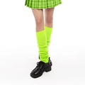 Neon green slouch socks paired with a green plaid skirt and black platform shoes - Fluorescent Green