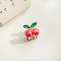 Sweet cherry mini hair claw clip in glossy red and green with a golden metal base - 2cm / True Red